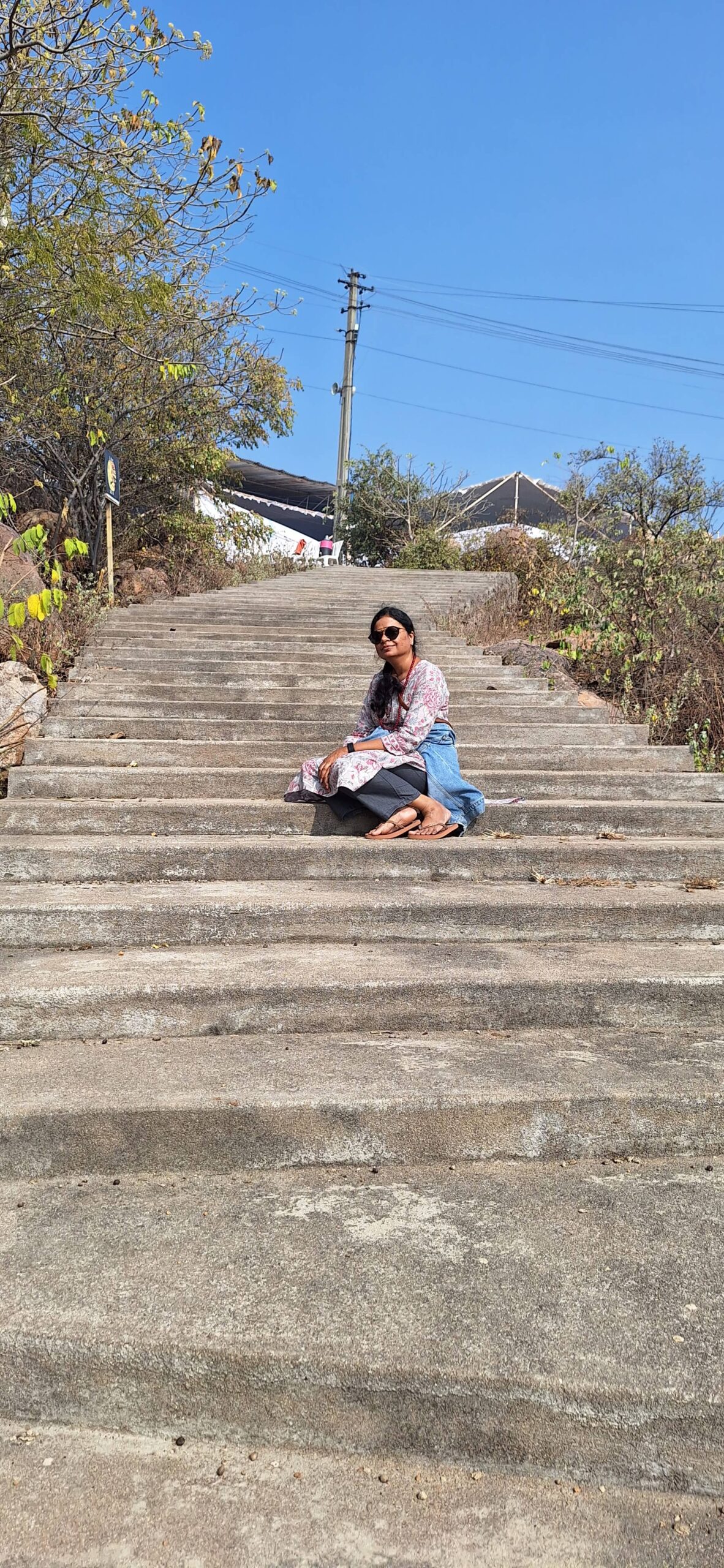 Jyothirmayee sitting on Mount Shamballa Steps
